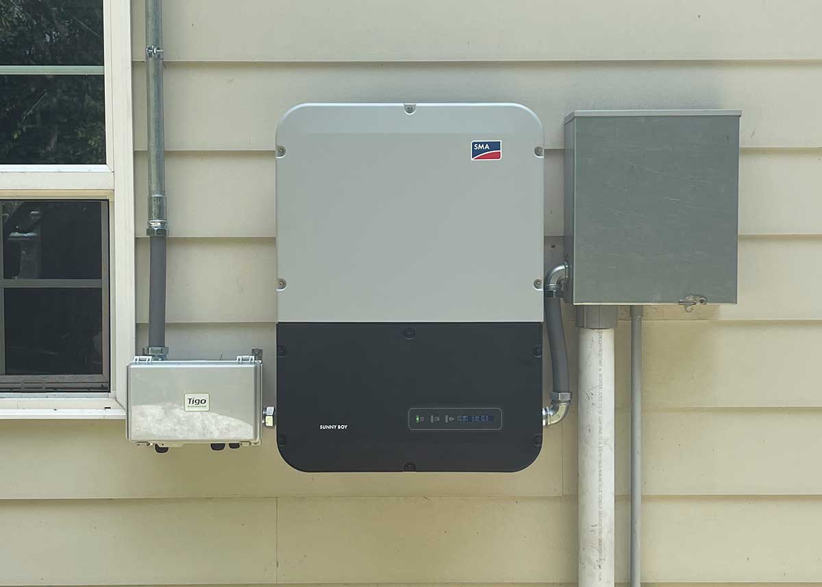 Generator system on the side of a house.